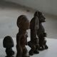 Set of 4 decorative handcrafted African wooden sculptures, mid-century.