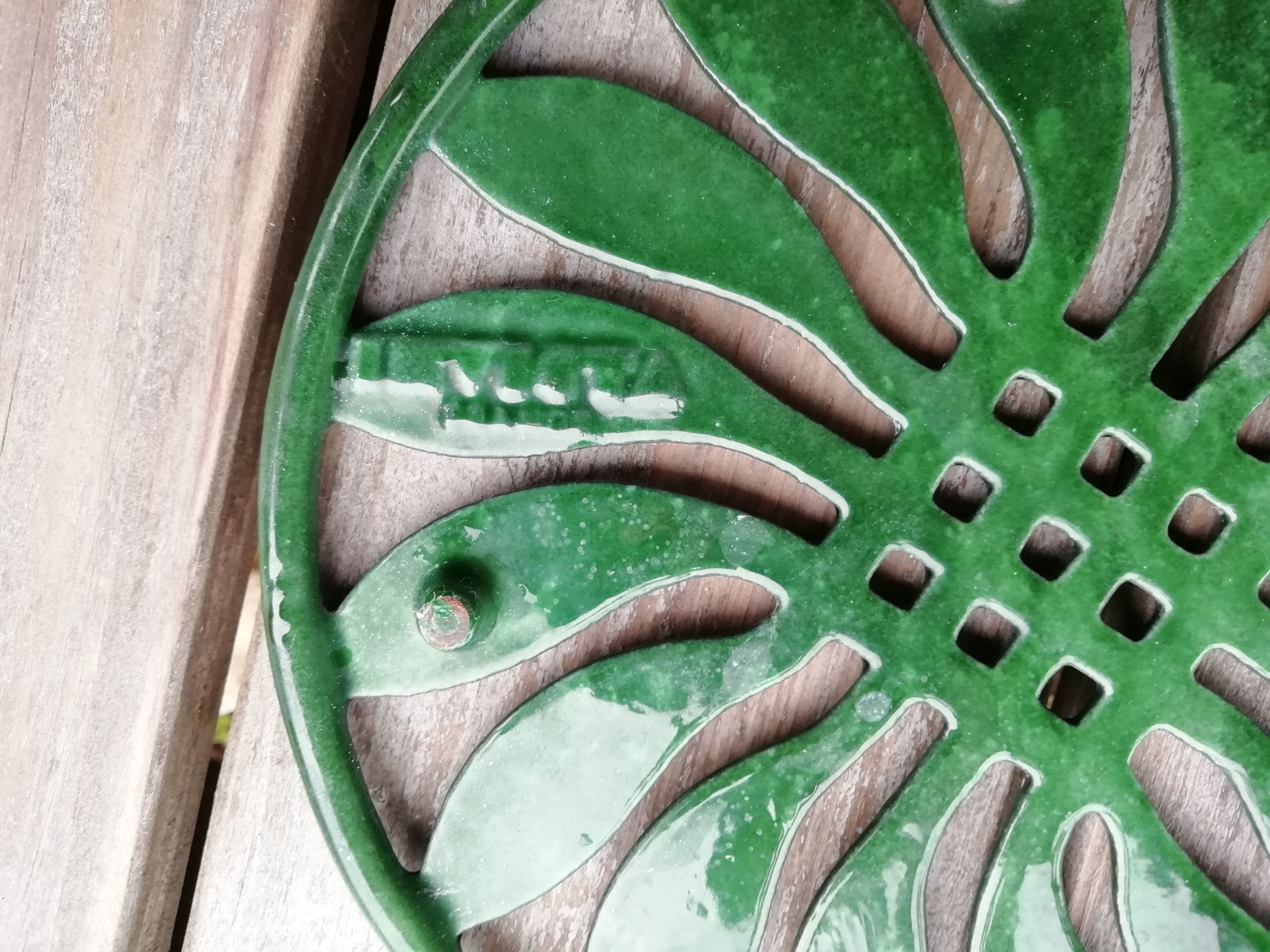 Pair of cast iron table mats