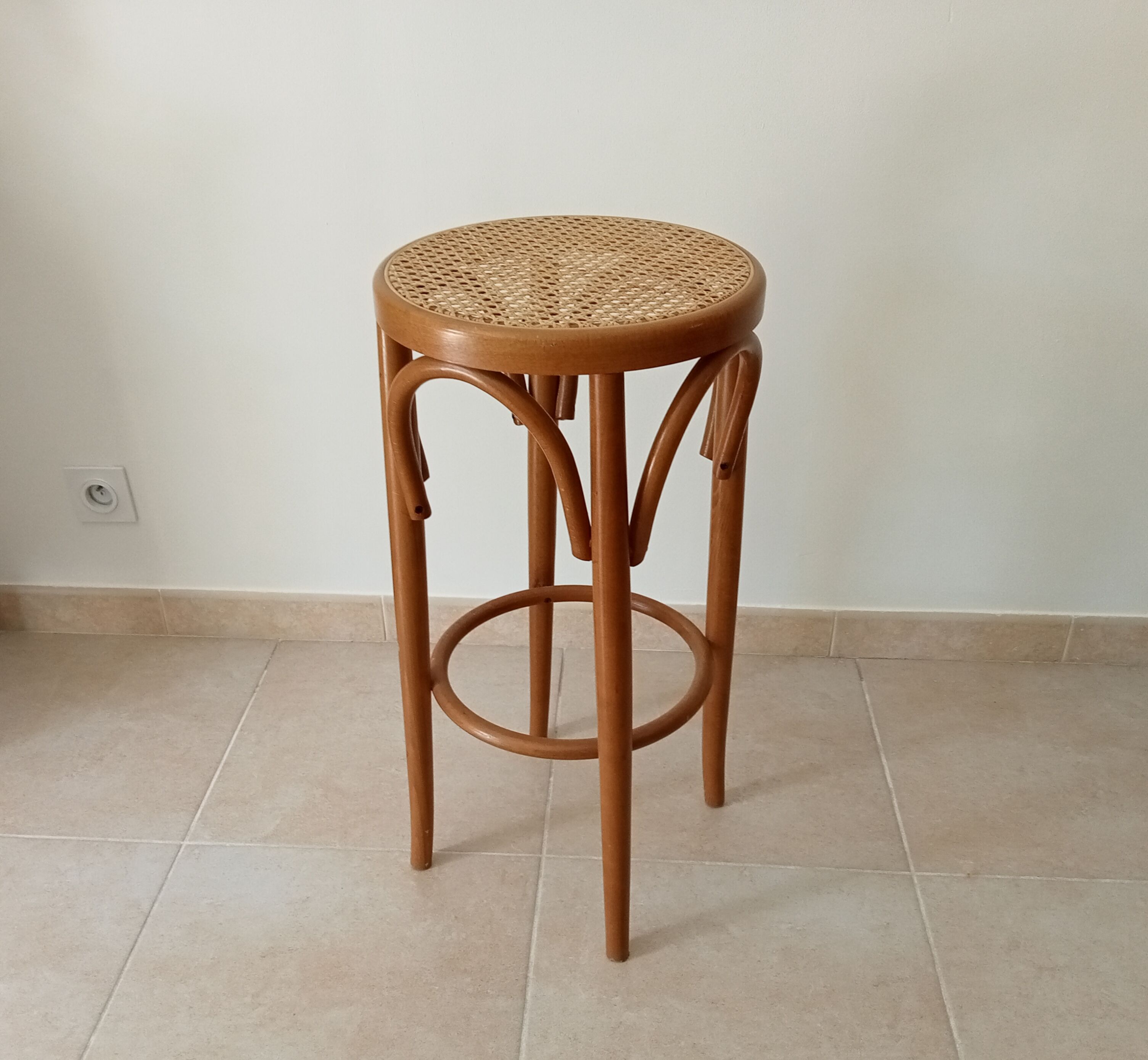 Vintage curved wooden high stool and tanned seat
