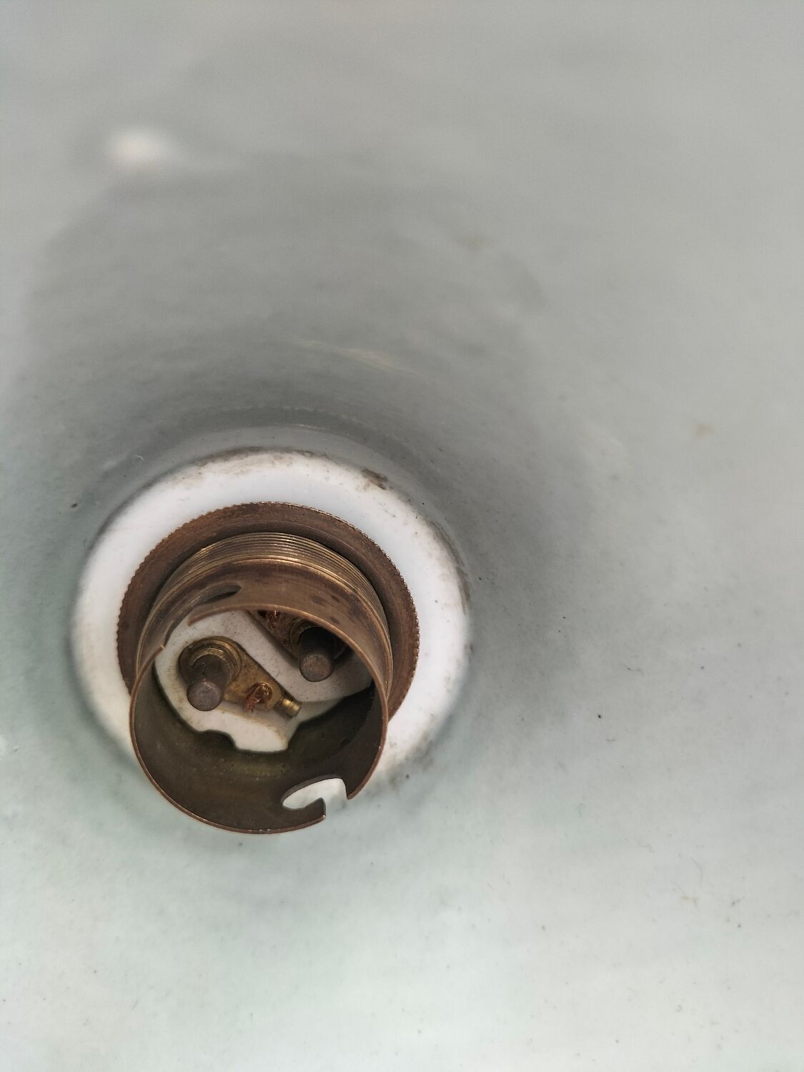 Enamelled sheet metal cone suspension