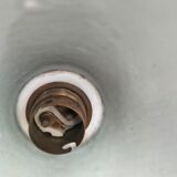 Enamelled sheet metal cone suspension