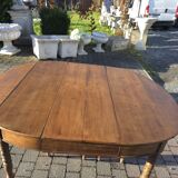 12-foot round oak table with 7 extensions / 20 people