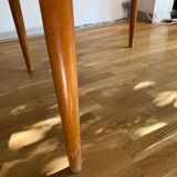 Extendable teak round table