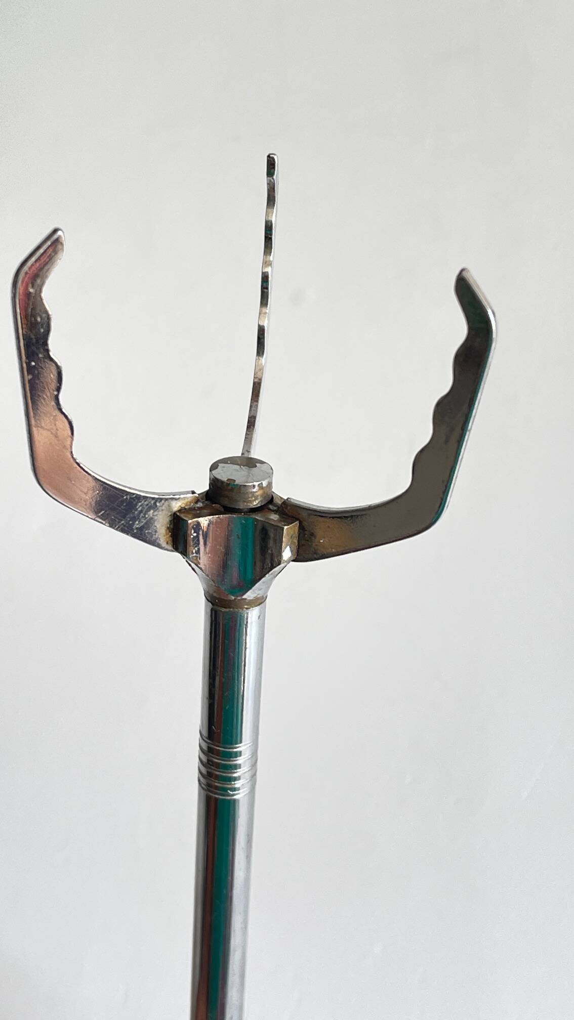 Long vintage chrome metal sugar tongs