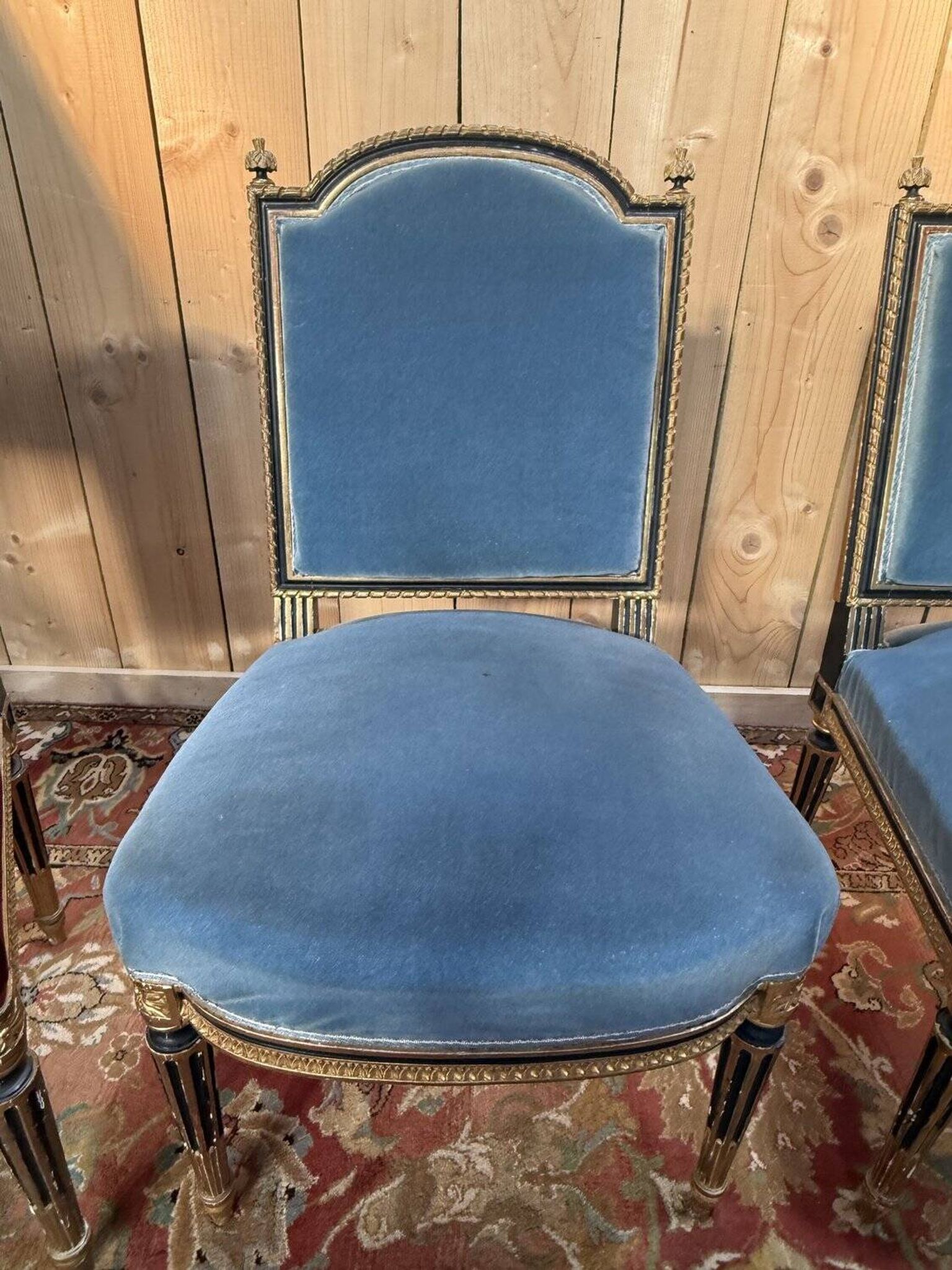 Set of 4 Napoleon III chairs in black and gold.