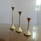 Series of 3 Scandinavian brass candle holders, 70s tulip foot