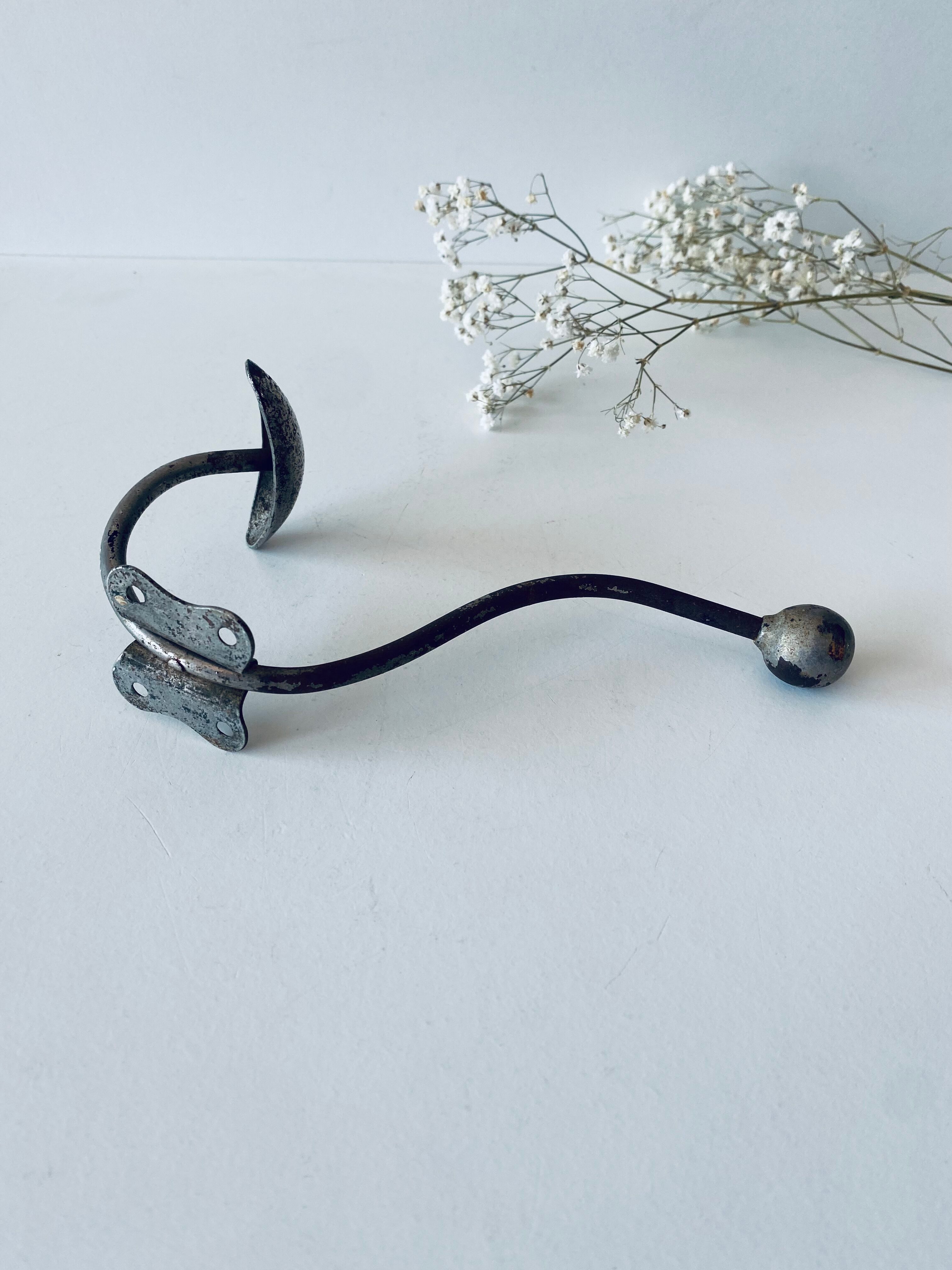 Ancient metal patère