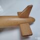 Vintage twin-engine aircraft in solid beech - Moulin Roty (1990s)