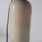 Lamp bottle in gres lampshade in black raffia