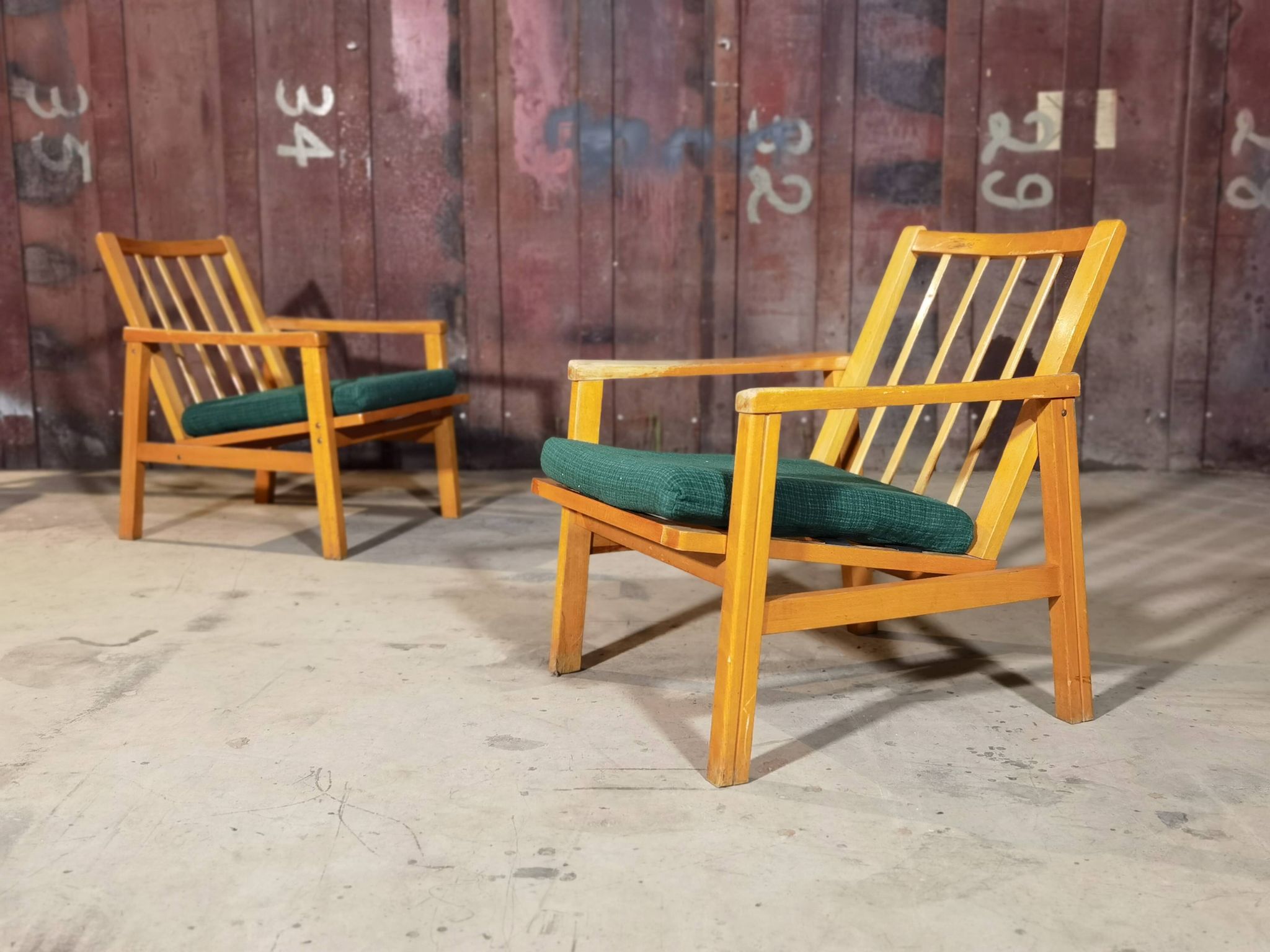 Pair of dark green armchairs