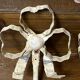 Metal and wood bow and ribbon hooks