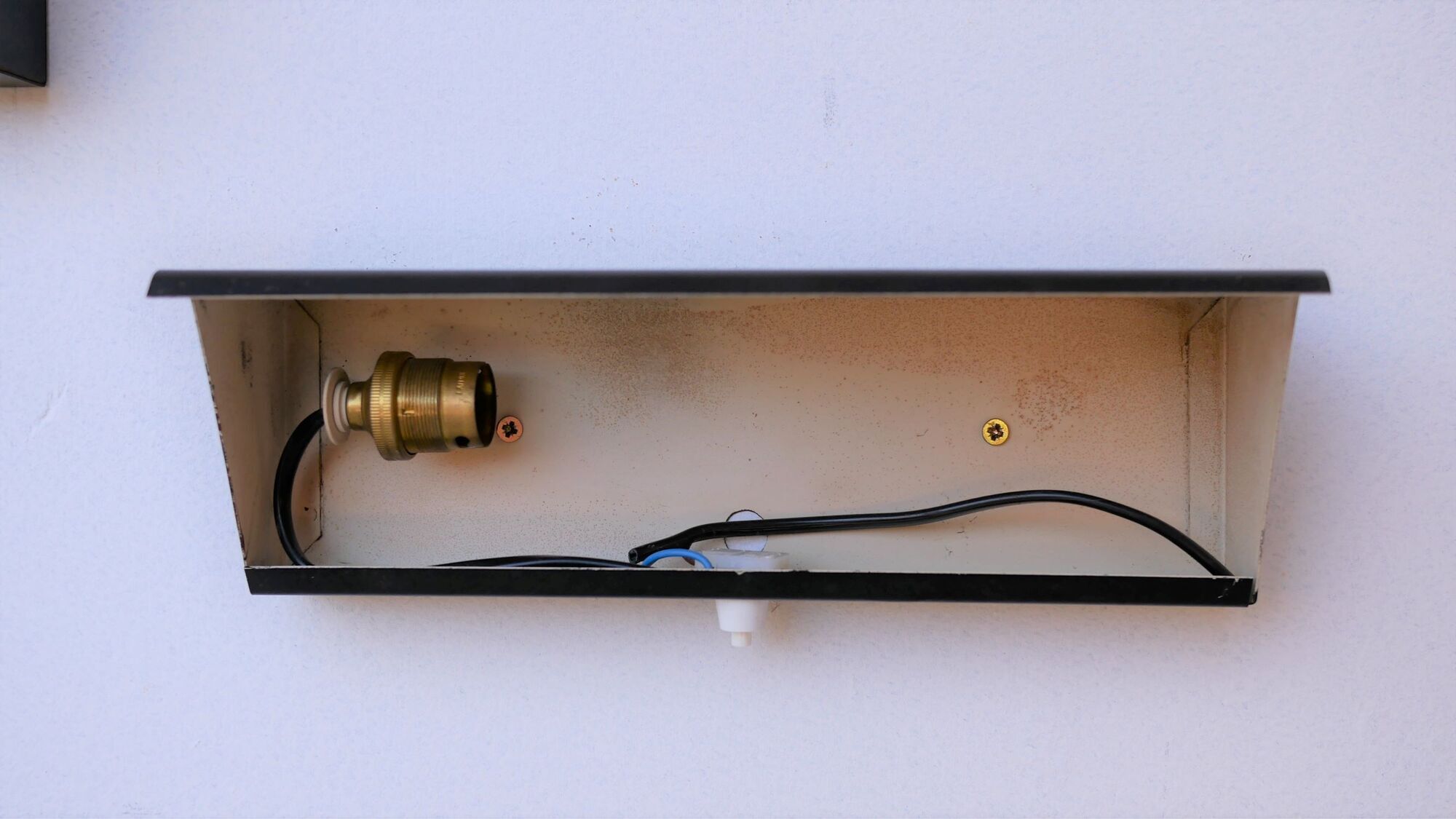 Pair of modernist metal wall light model 212, by Jacques Biny for Luminalite