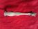 Silver sugar tongs with engraved decoration and lion claws.