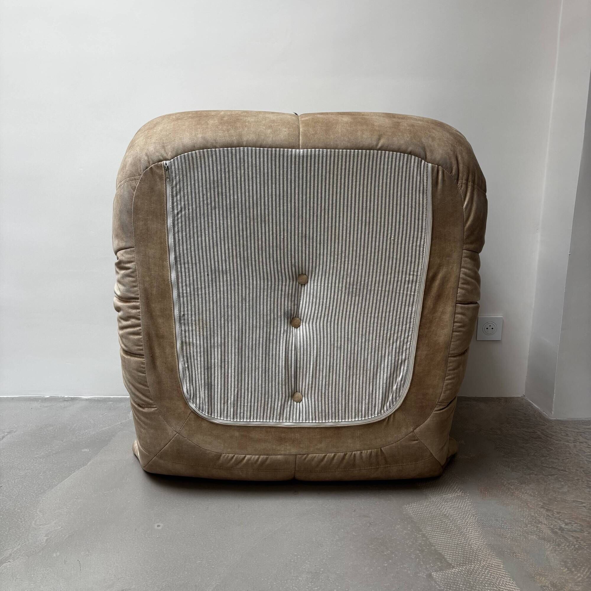Amber beige Togo armchair by Michel Ducaroy for Ligne Roset.