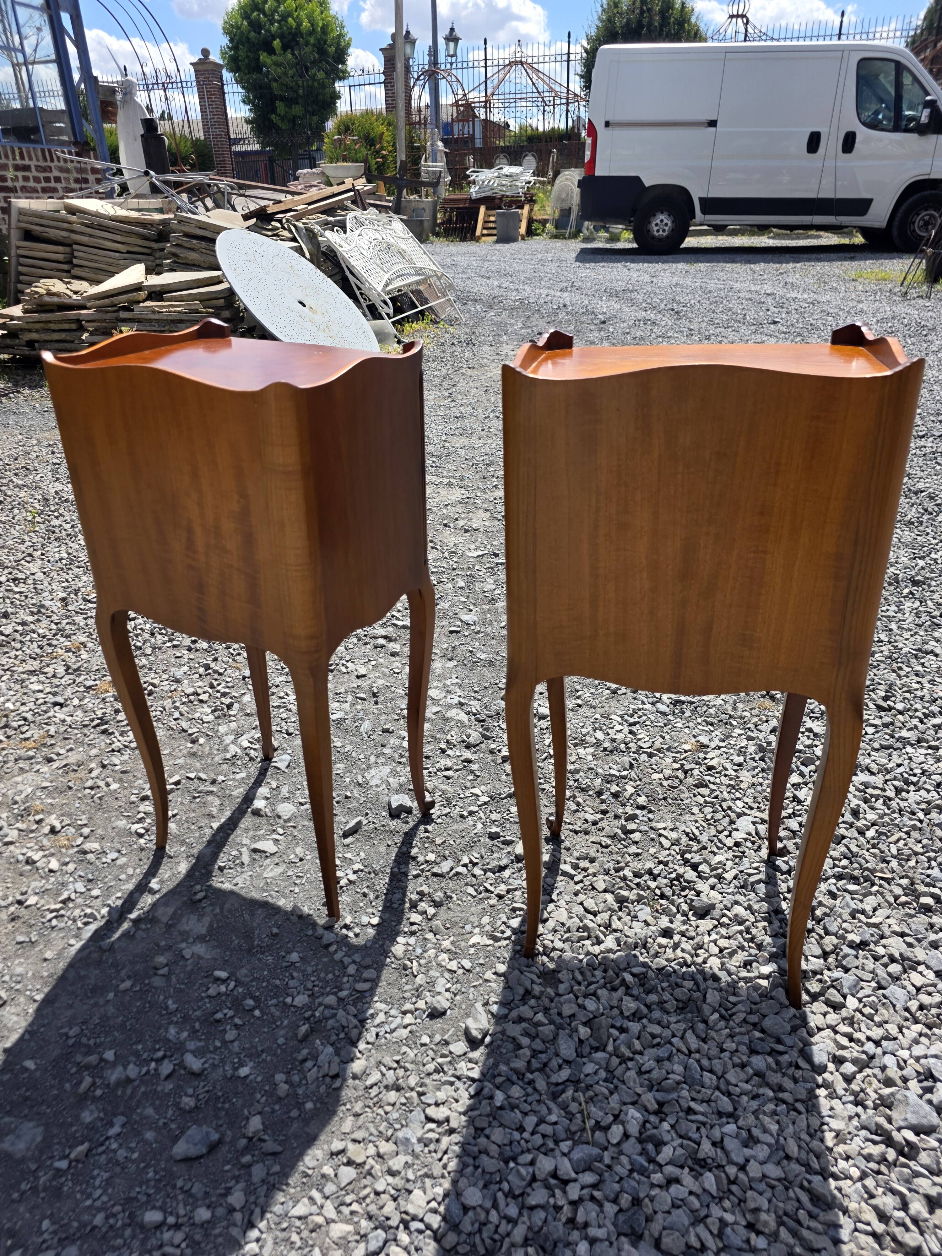 Pair of Louis XV style bedside tables in cherry wood.