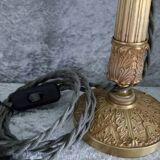 Paire de lampes bougeoirs en bronze ciselé
