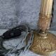 Paire de lampes bougeoirs en bronze ciselé