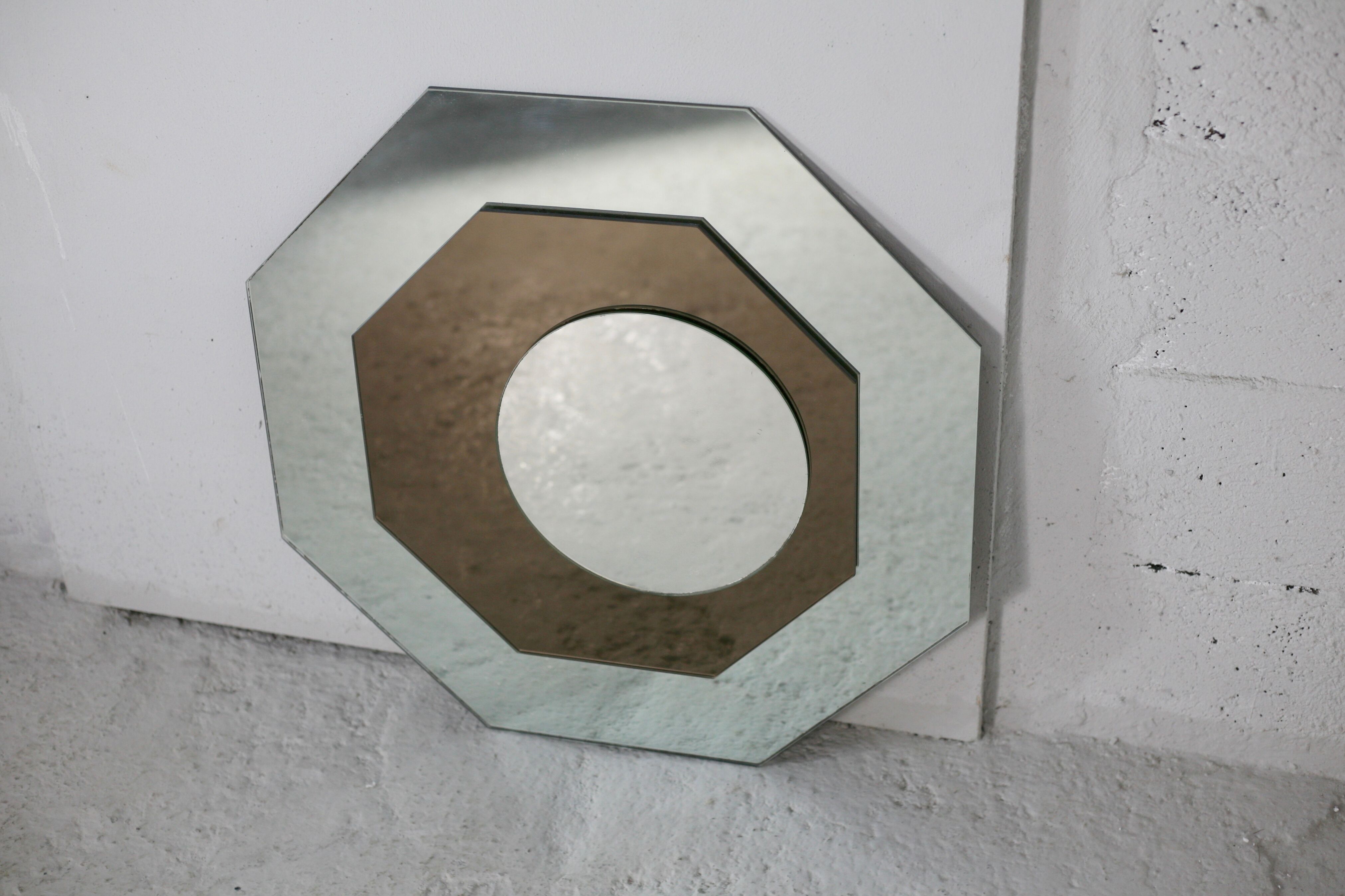 Pair of "kinetic" mirrors, France, circa 1970