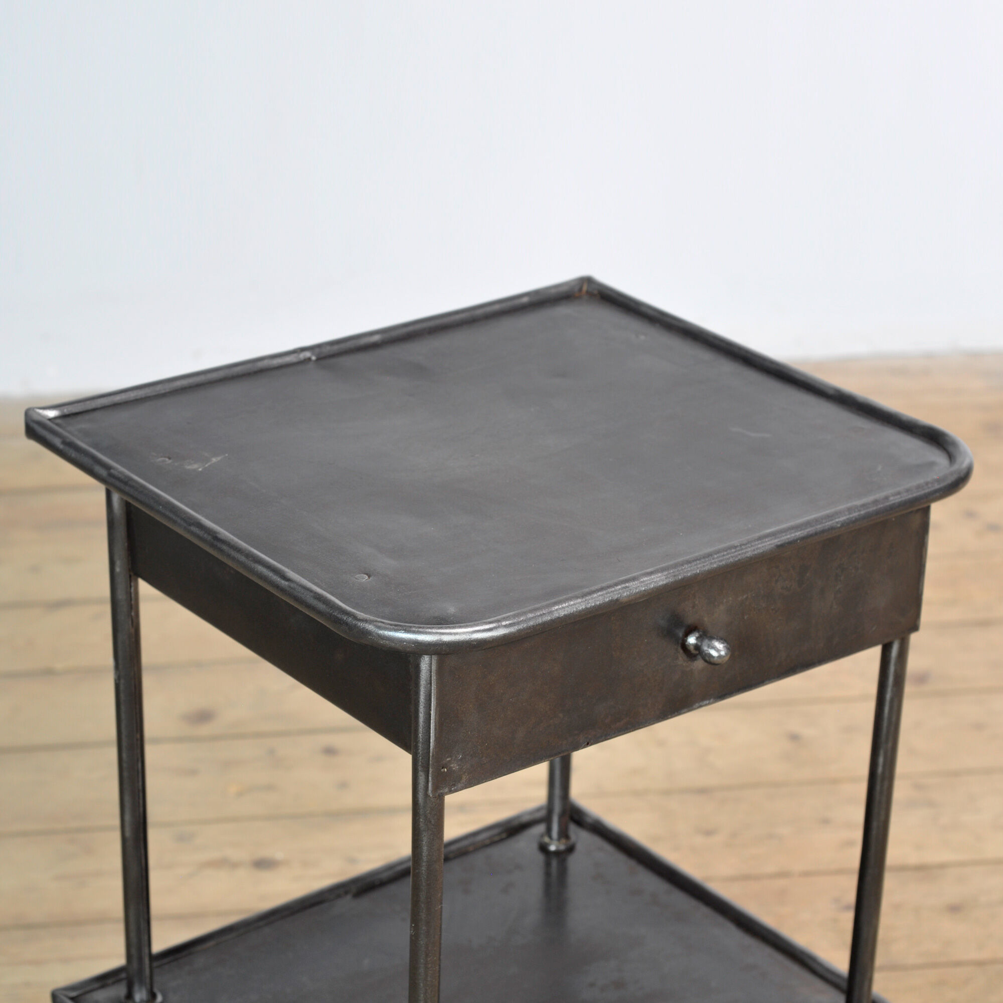 Set of iron bedside tables, 1910s