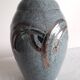 Platinum art deco enamelled ceramic ovoid vase