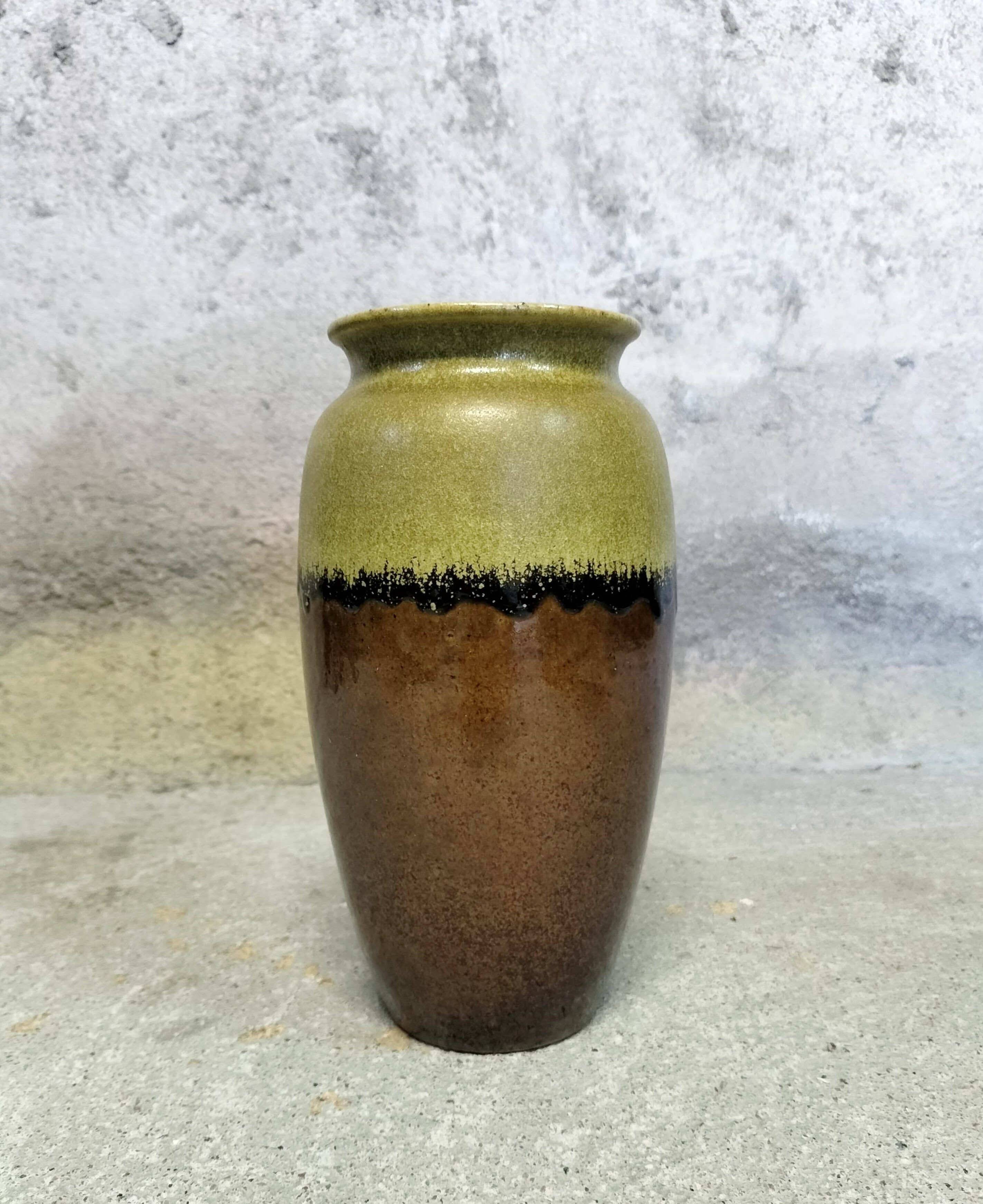 Lime green, black and brown ceramic vase.
