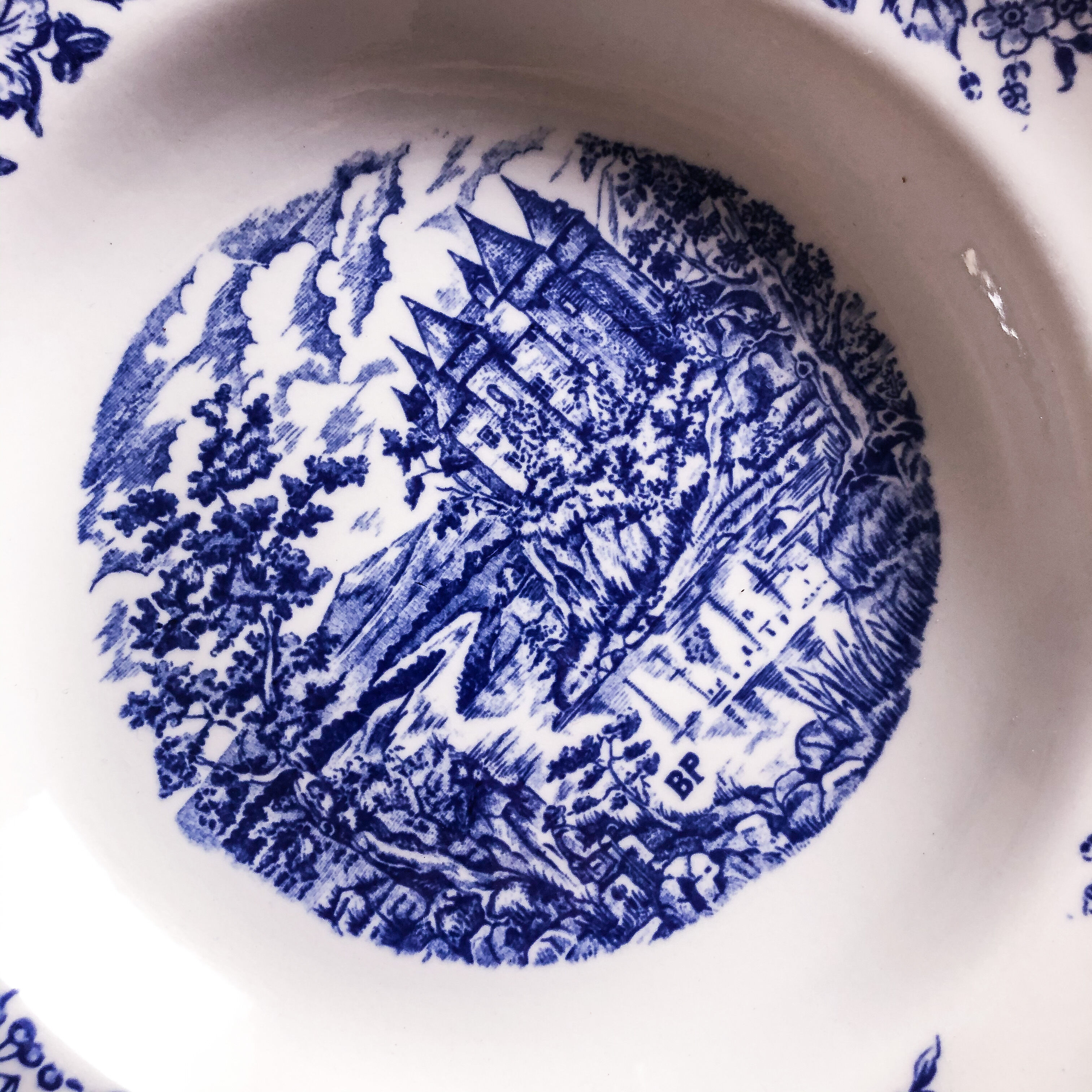 Trio of hollow porcelain plates