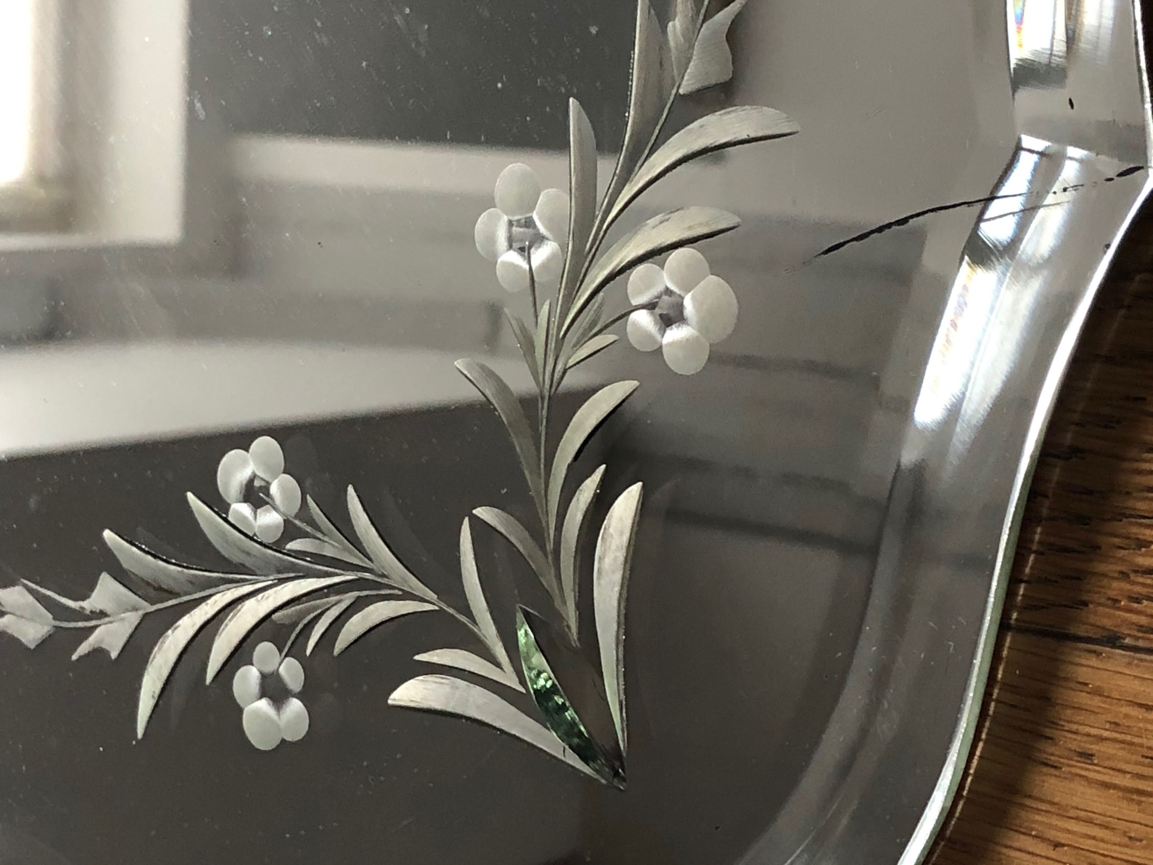 Old bevelled and engraved mirror   43x63cm