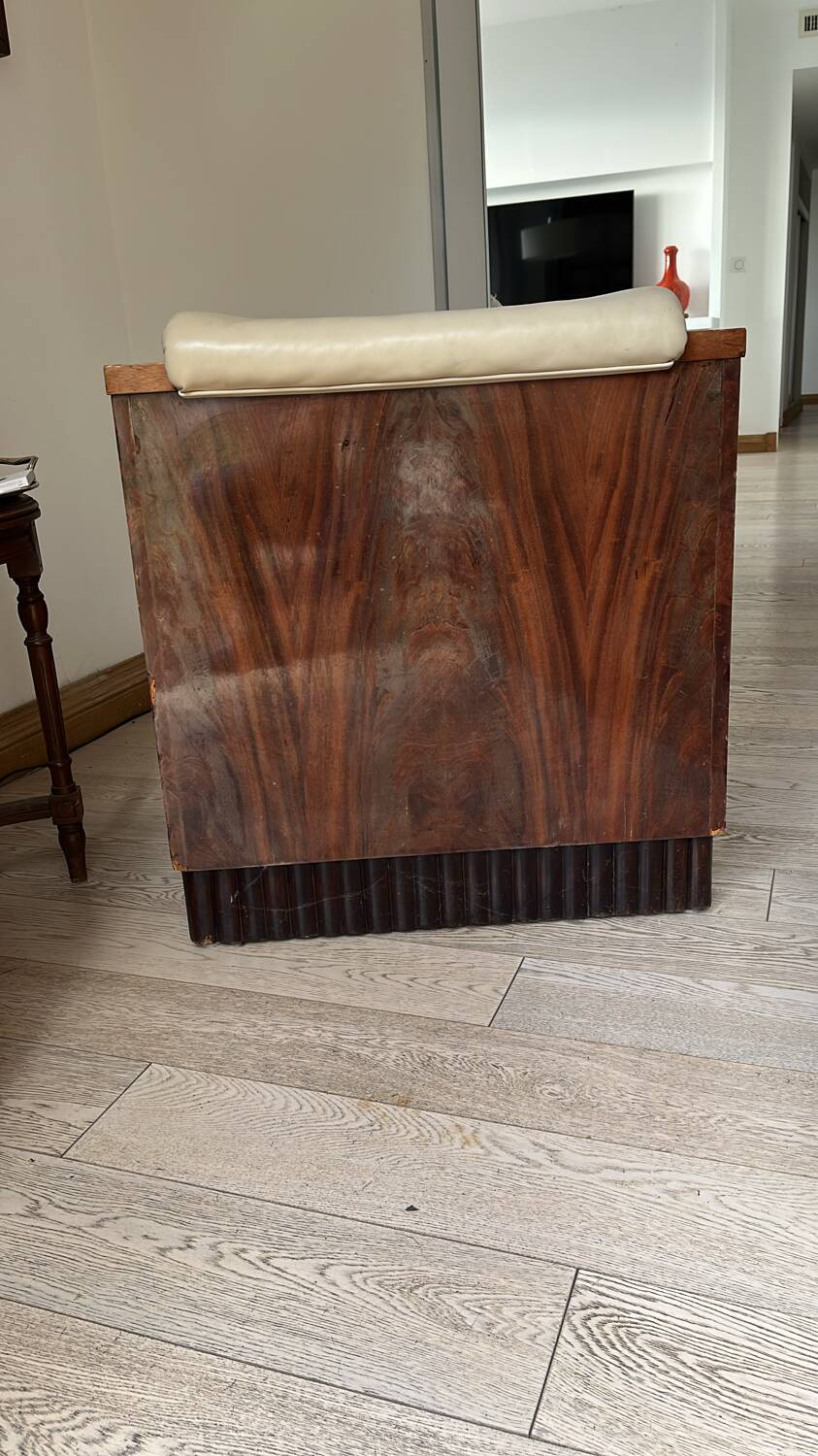 Two armchairs and an Art Deco style pouf