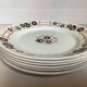 Six old flat plates, earthenware, 1930s, Nymphéas model.