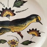 Decorative earthenware plate with bird decoration from the ALMI collection. Handmade.