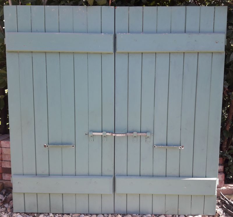 Pair of wooden iron hanging shutters