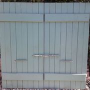 Pair of wooden iron hanging shutters