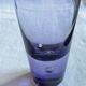9 short glasses in purple glass