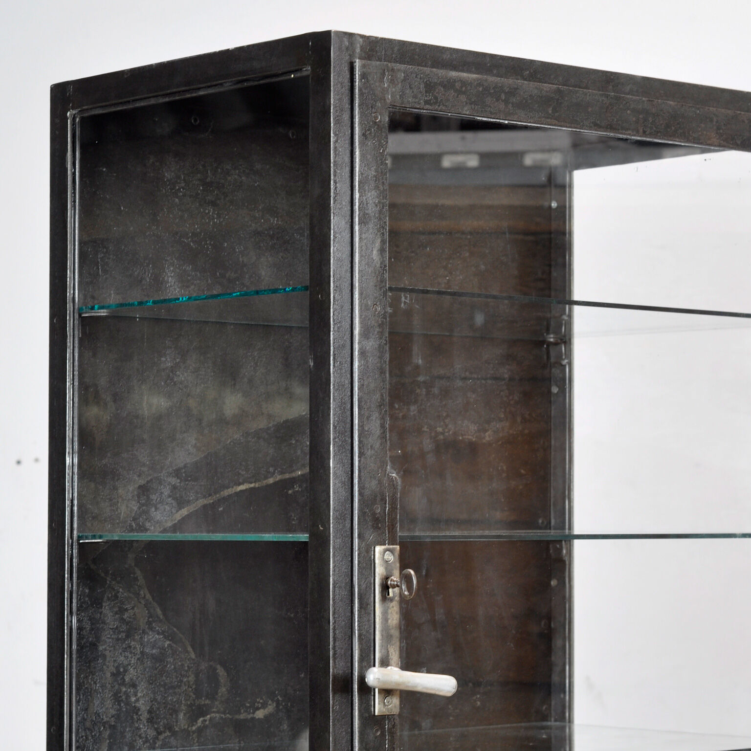 Polished iron medical cabinet, 1930s