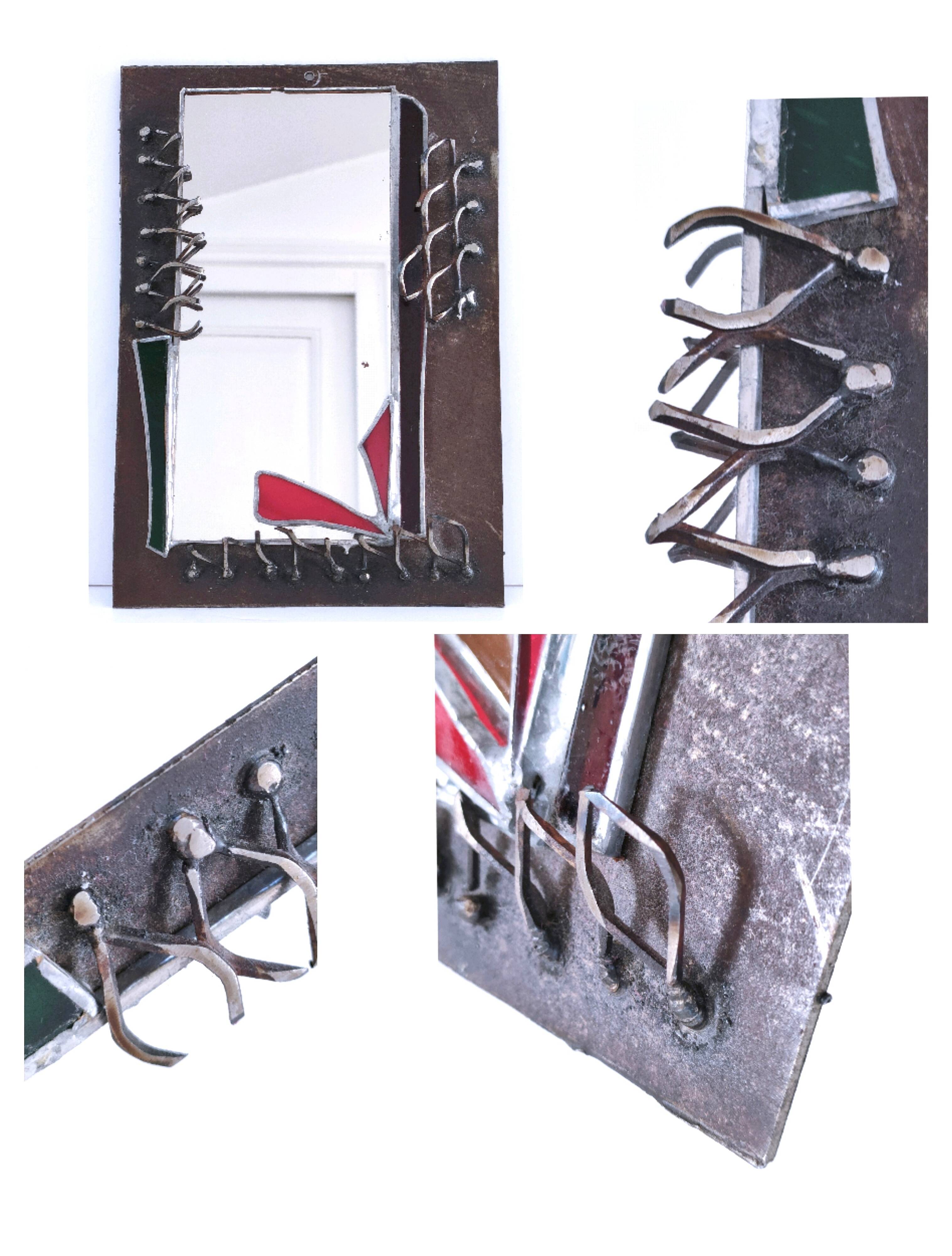 Brutalist mirror in metal and set glass