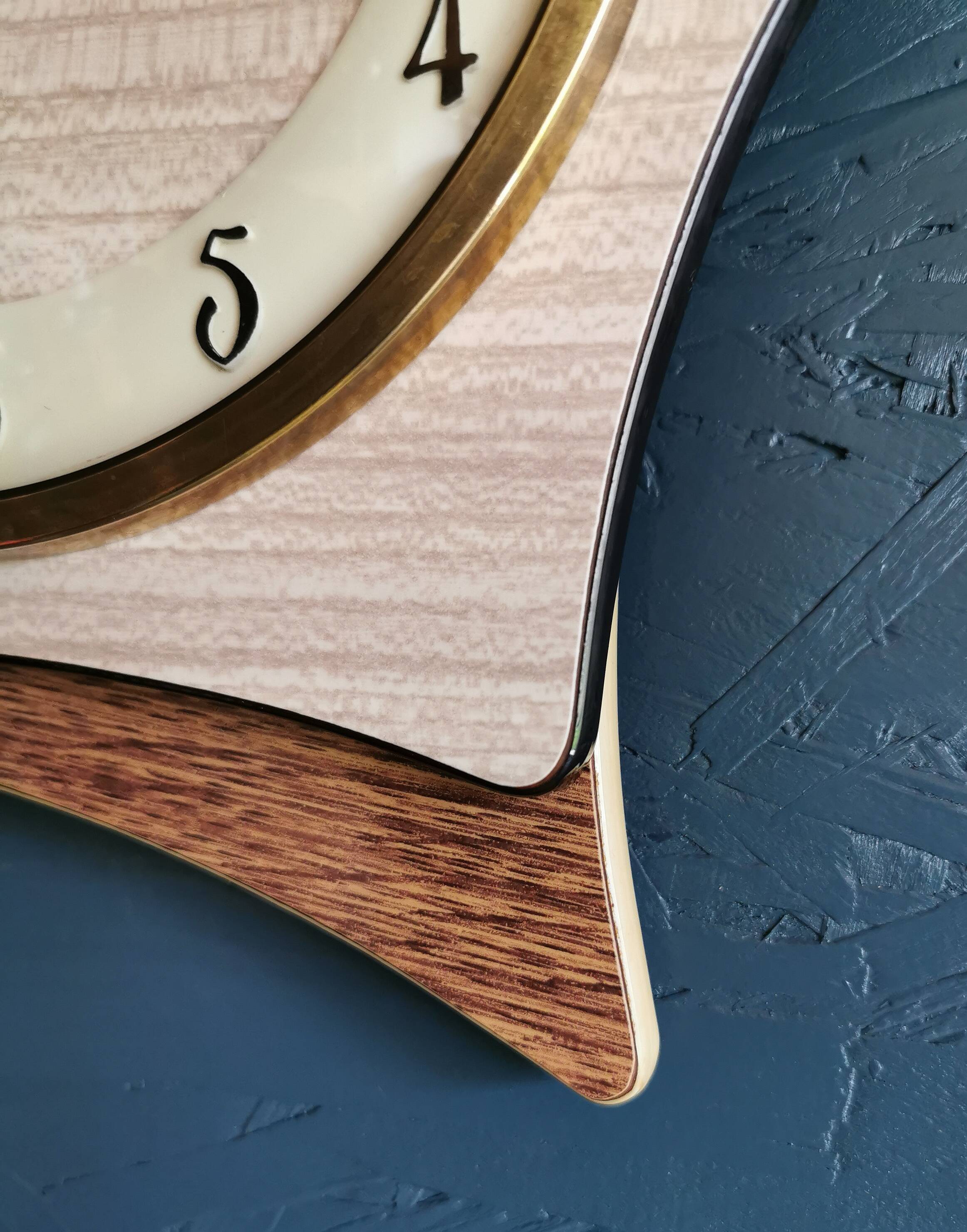 Vintage formica clock silent asymmetrical wall pendulum "Jura bois"