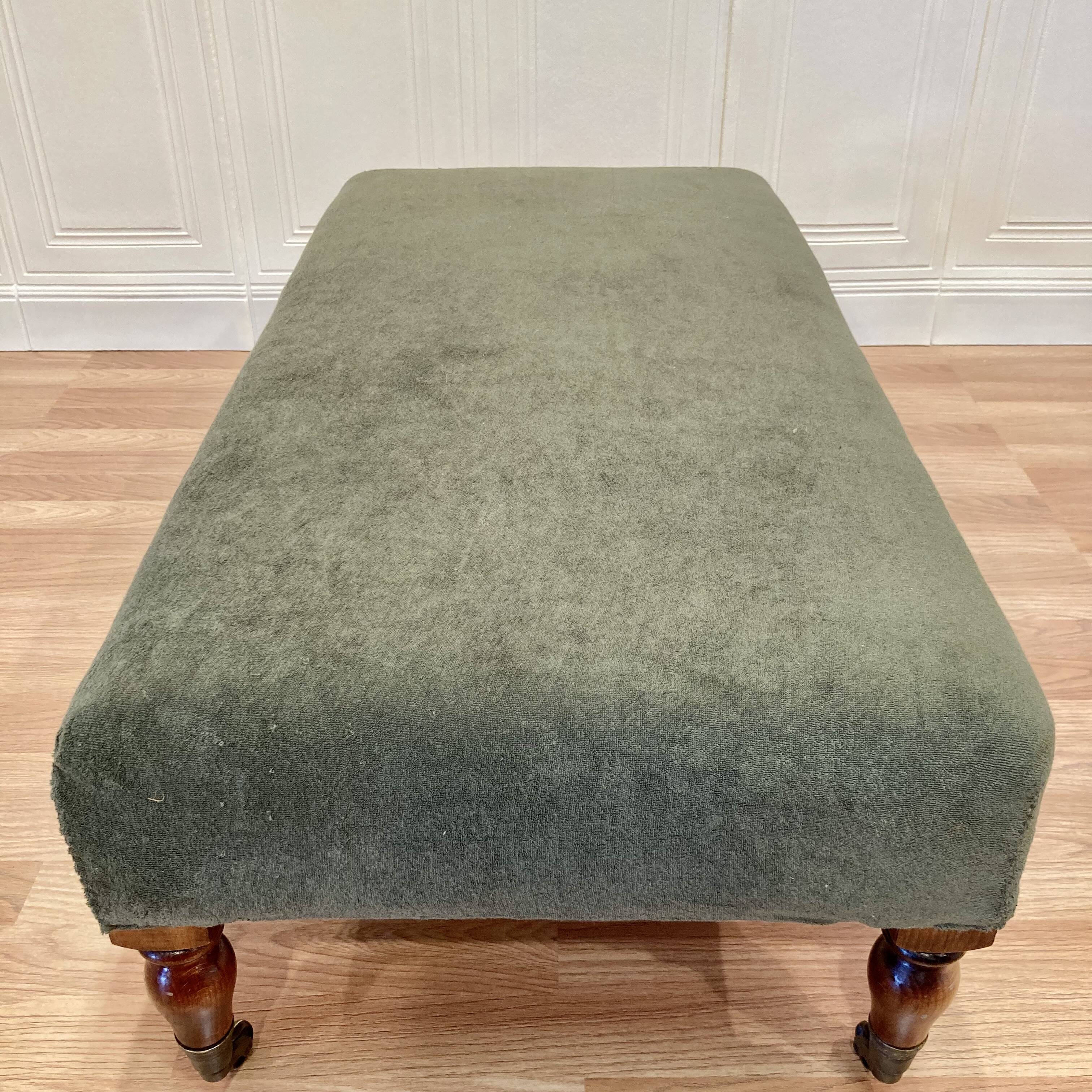 Khaki and oak sofa on casters, 1950s design.