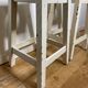 Pair of vintage cream stools in painted wood