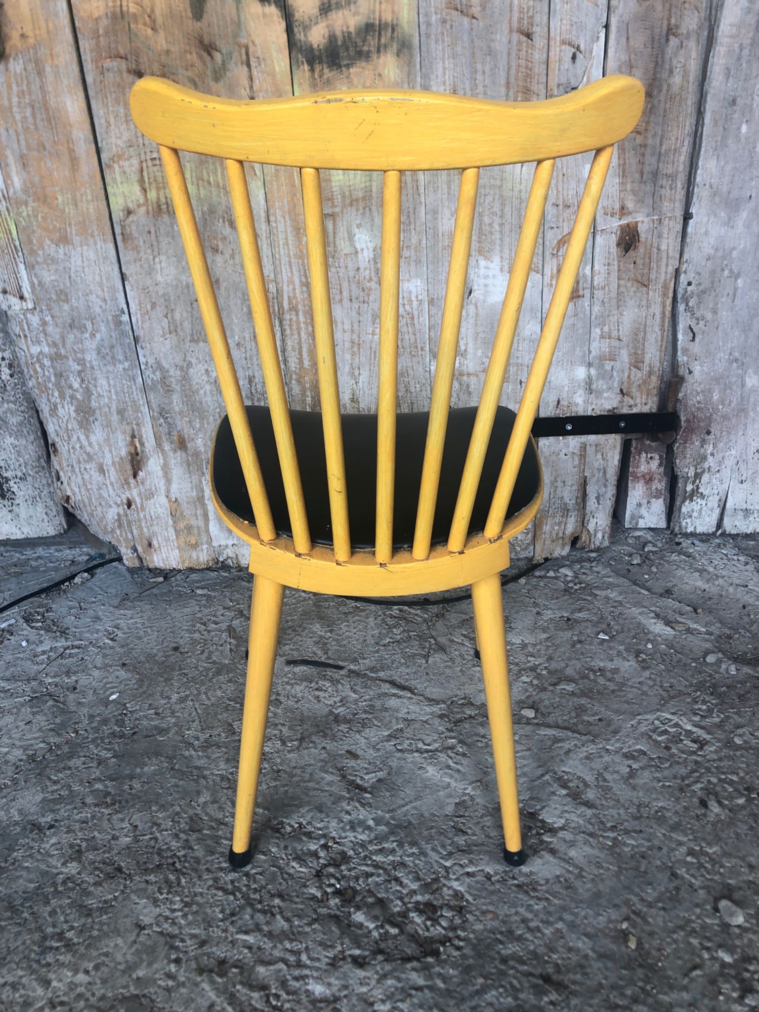 Baumann western style chair in yellow wood + vintage black skai seat