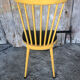 Baumann western style chair in yellow wood + vintage black skai seat