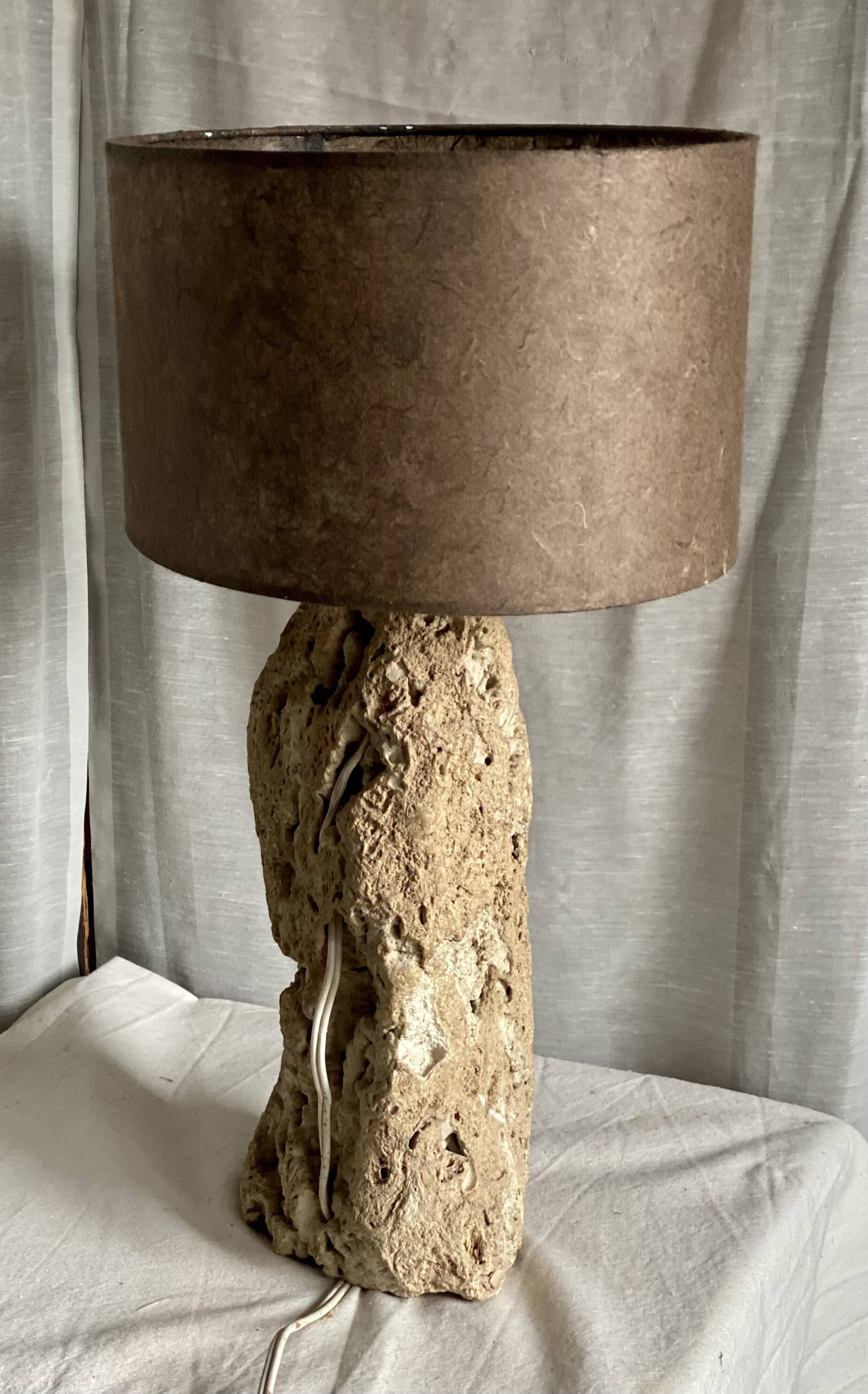 Brutalist vintage stone lamp from the 1970s, raw art.