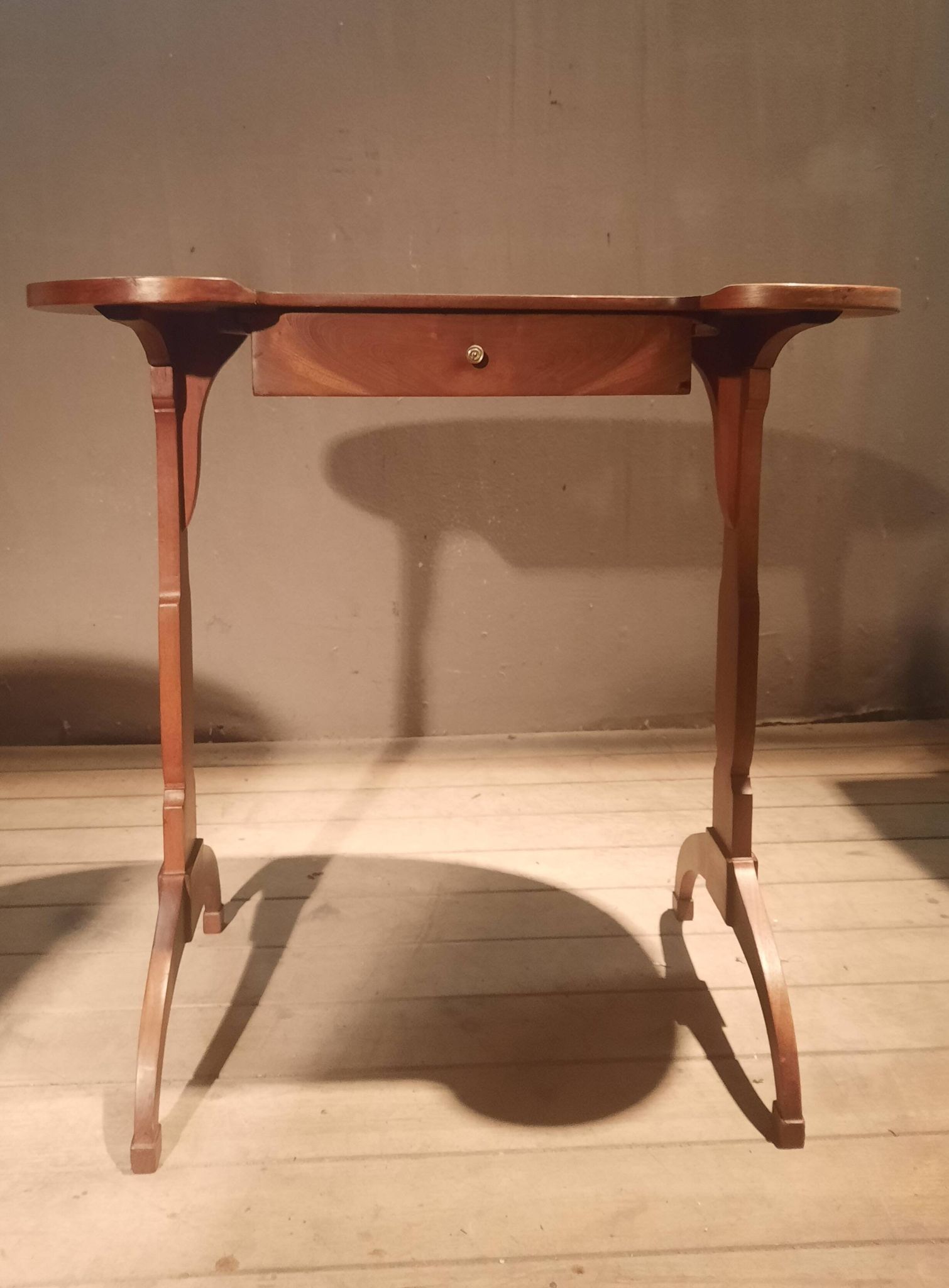 Kidney-shaped side table