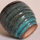 Ceramic planter with speckled enamel gadroons from the 1940s