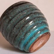 Ceramic planter with speckled enamel gadroons from the 1940s