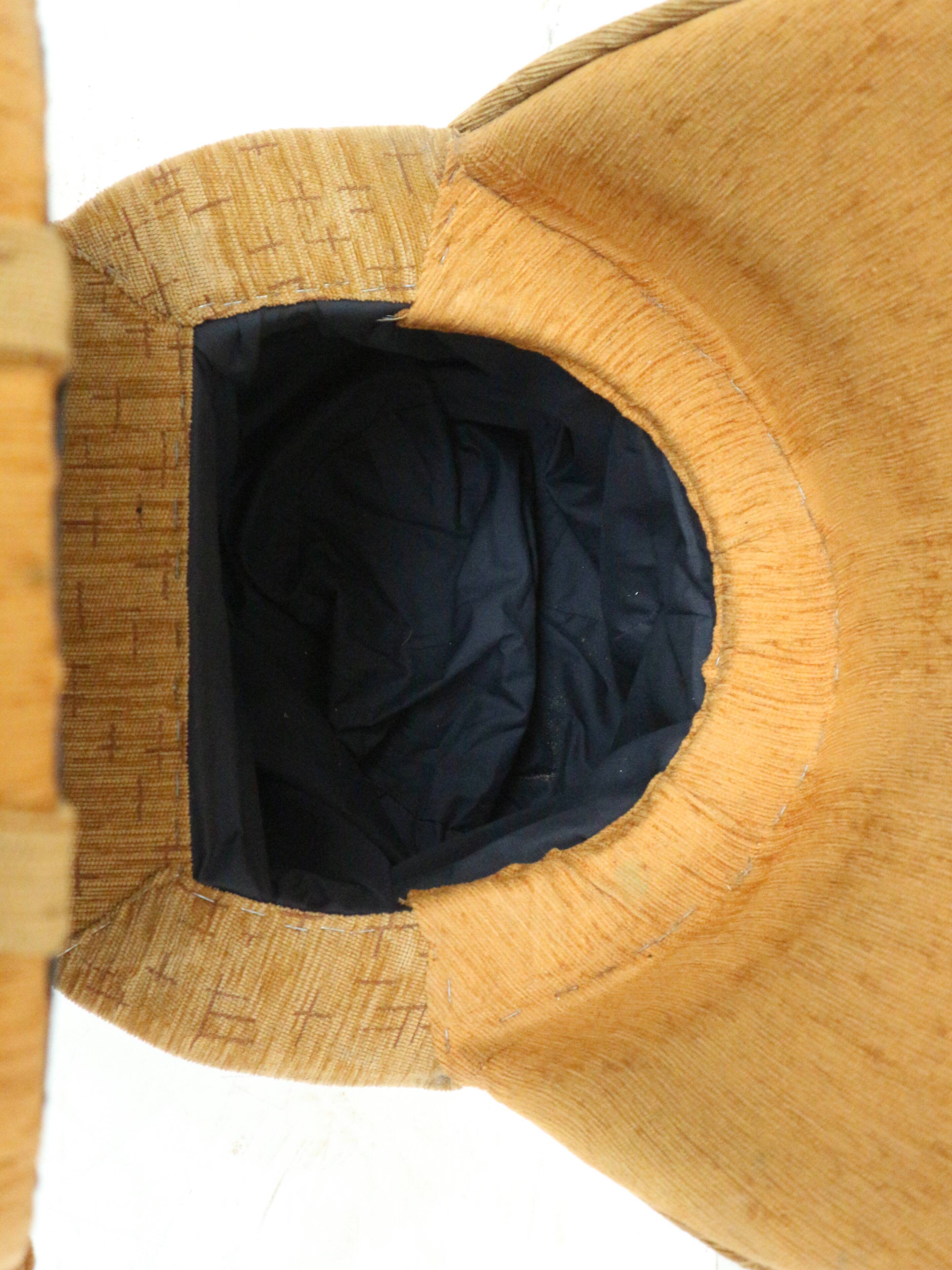 Yellow vintage armchair with storage space made in the 70s