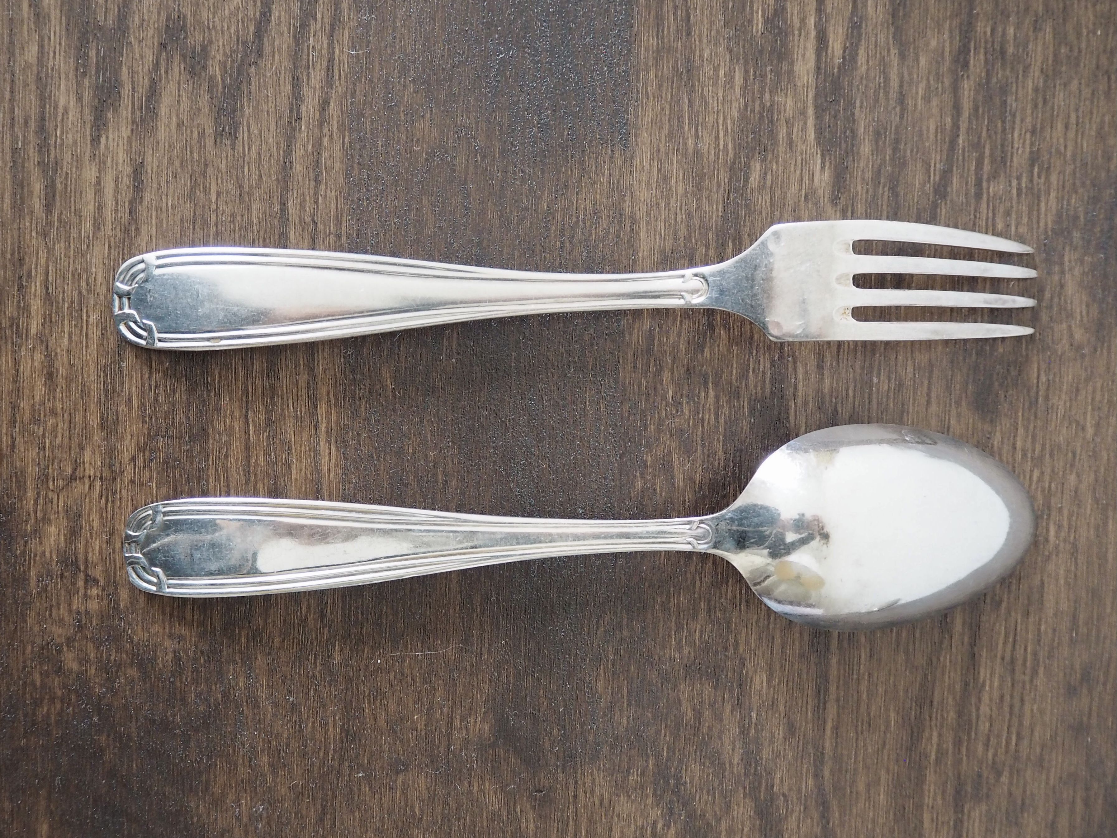 Set of 6 forks and 6 spoons in silver metal with punches