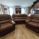 three-seater sofa and two armchairs