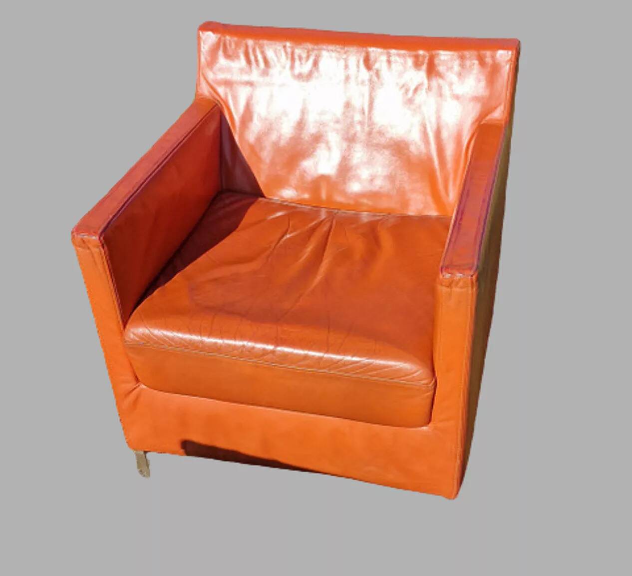 14 armchairs and 4 vintage orange leather benches