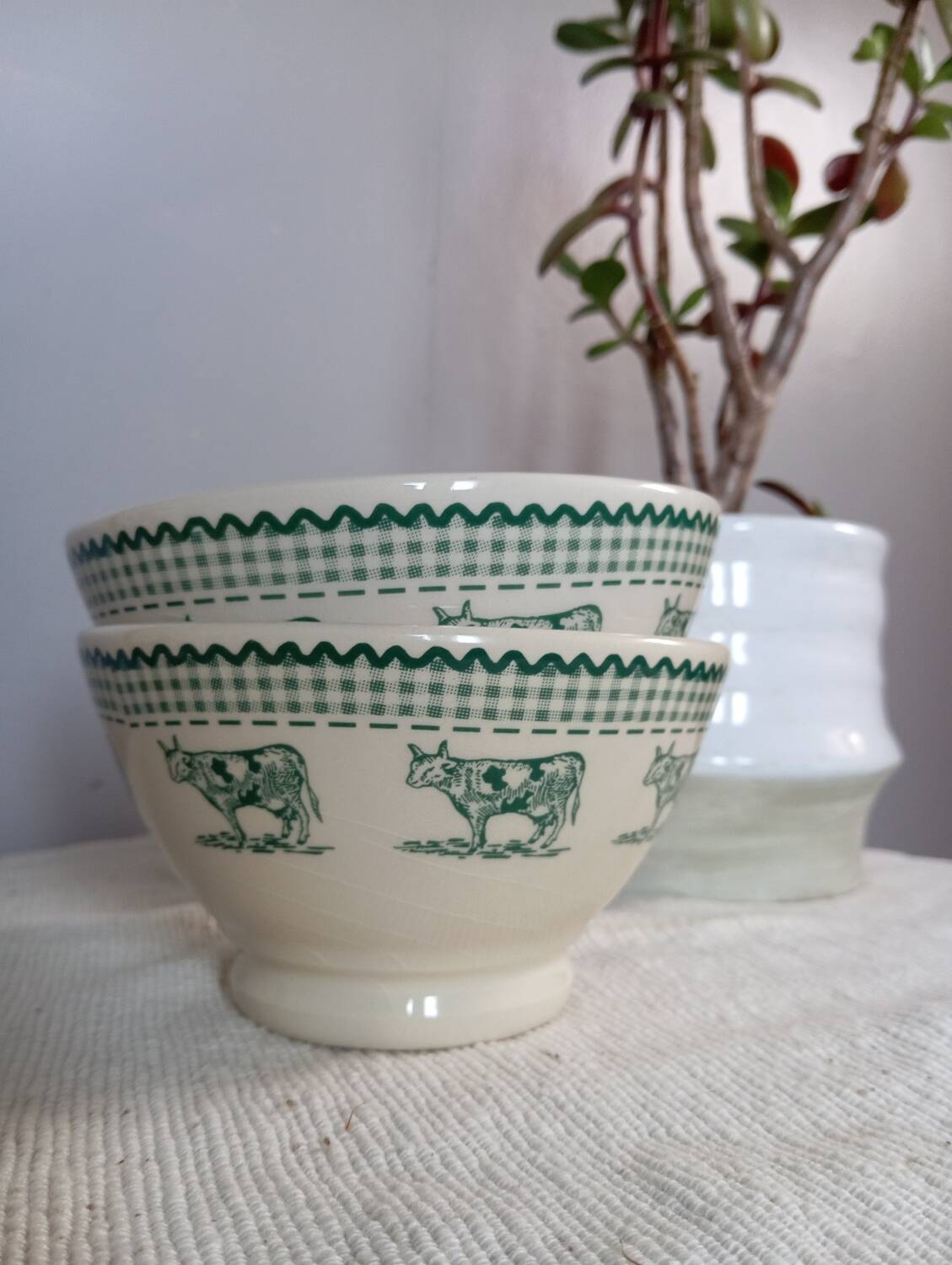 Duo of “daisy” cow decor bowls by Geneviève Lethu, 1996