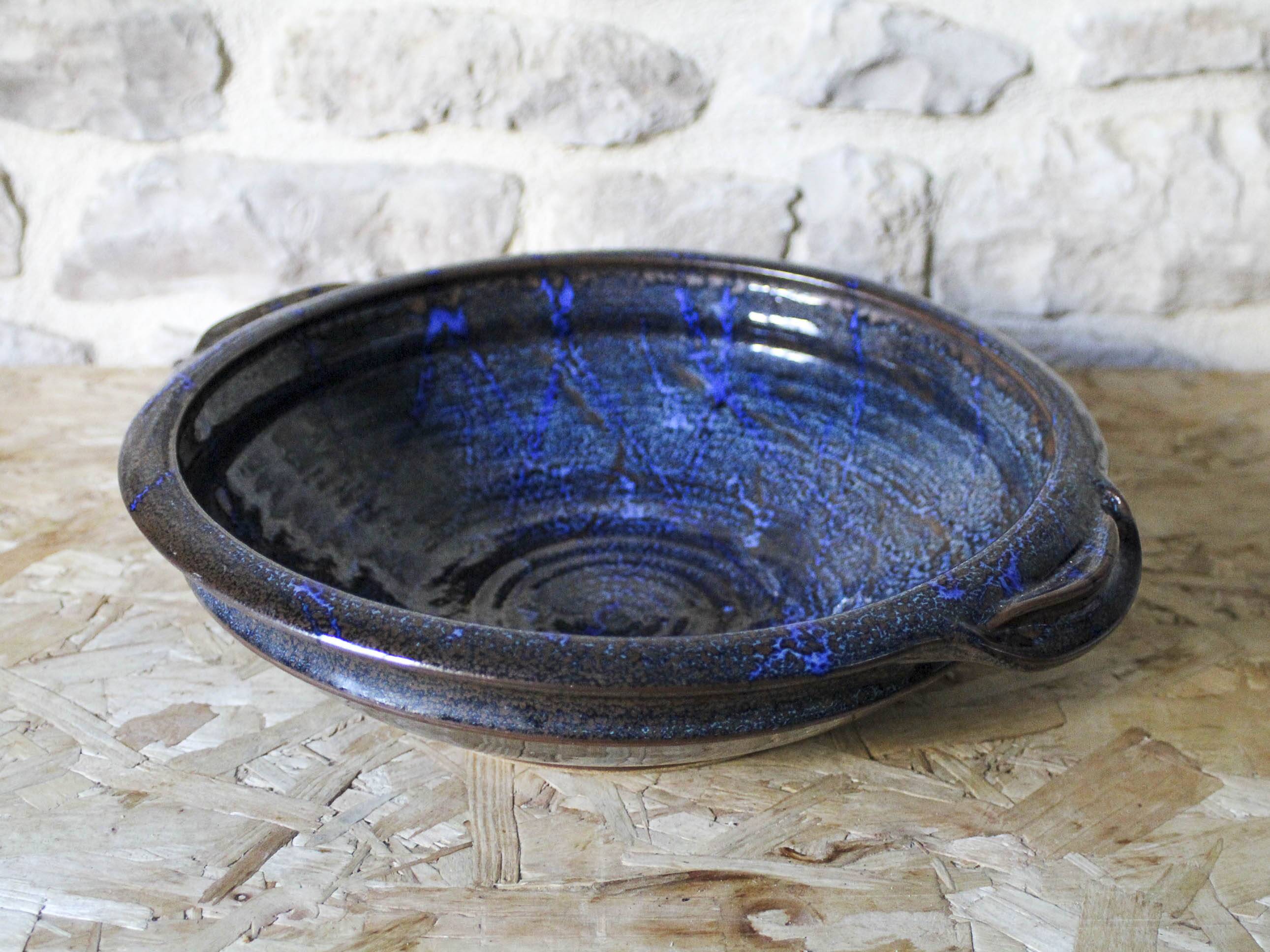 Enamelled ceramic hollow dish signed